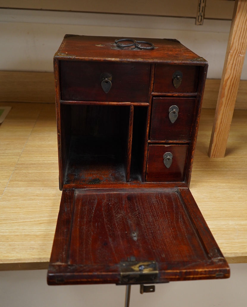 A 19th century Chinese elm scholar's seal cabinet with key, 31cm high. Condition - fair